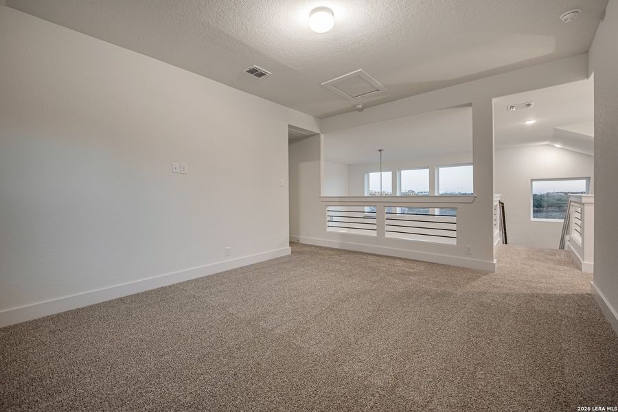Spacious, unfurnished interior of a new home in Stillwater Ranch, San Antonio (Image 24).
