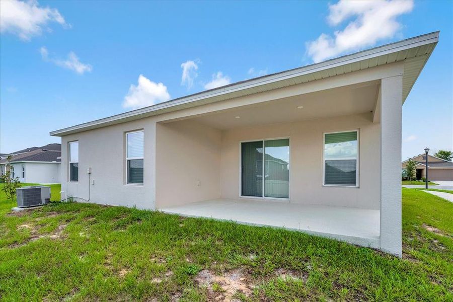 Front exterior of a new home in , Davenport, FL, highlighting curb appeal (Image 25). Front exterior of a new home in , Davenport, FL, highlighting curb appeal (Image 25).