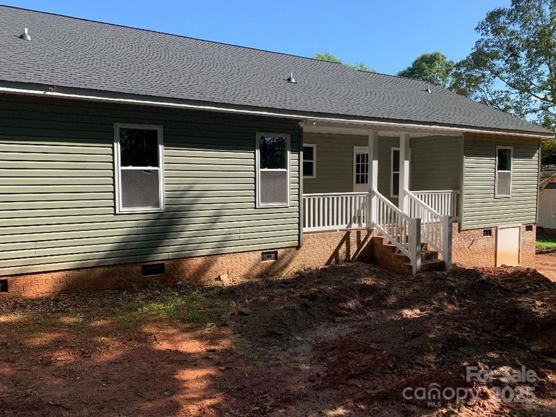 Front exterior of a new home in , Statesville, NC, highlighting curb appeal (Image 11).