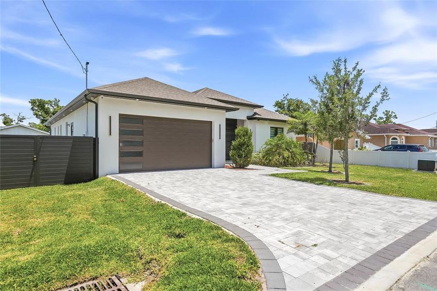 Front exterior of a new home in , Tampa, FL, highlighting curb appeal (Image 26).