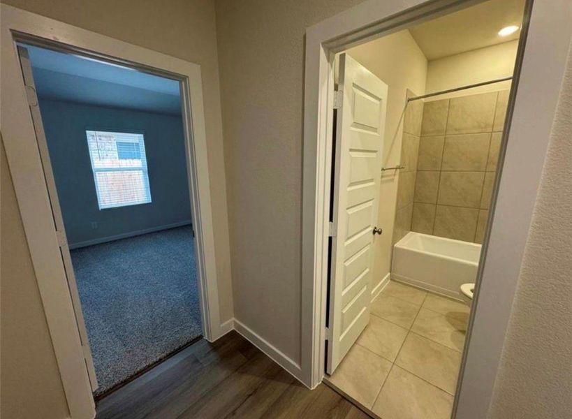 Spacious, unfurnished interior of a new home in Wall Street Village, Richmond (Image 15).