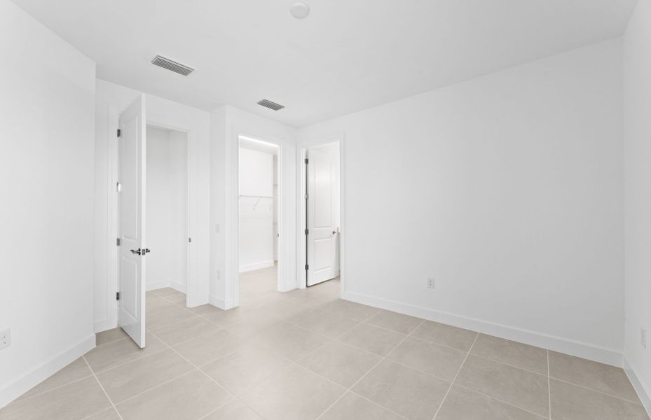 Spacious owner's suite bedroom Spacious owner's suite bedroom