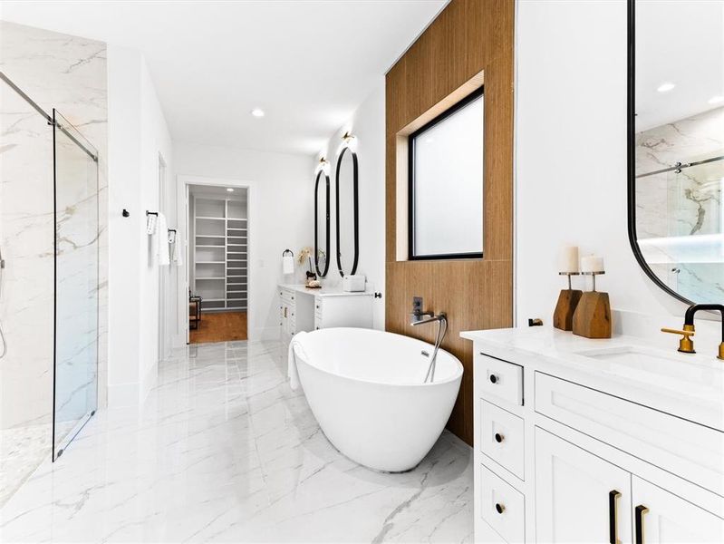 Bathroom with plus walk in shower, tile flooring, and vanity