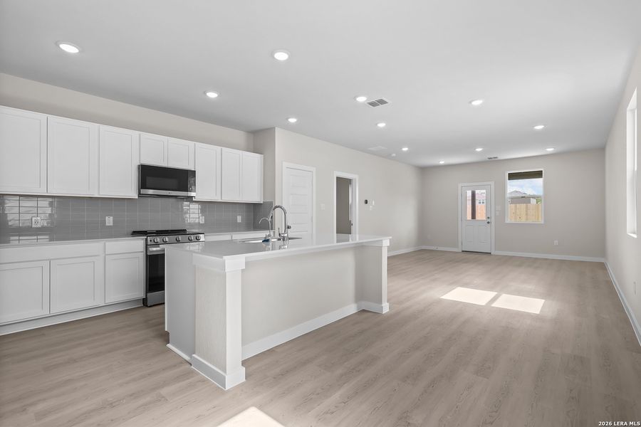 Furnished interior view inside a new home in Spring Creek, San Antonio (Image 13).