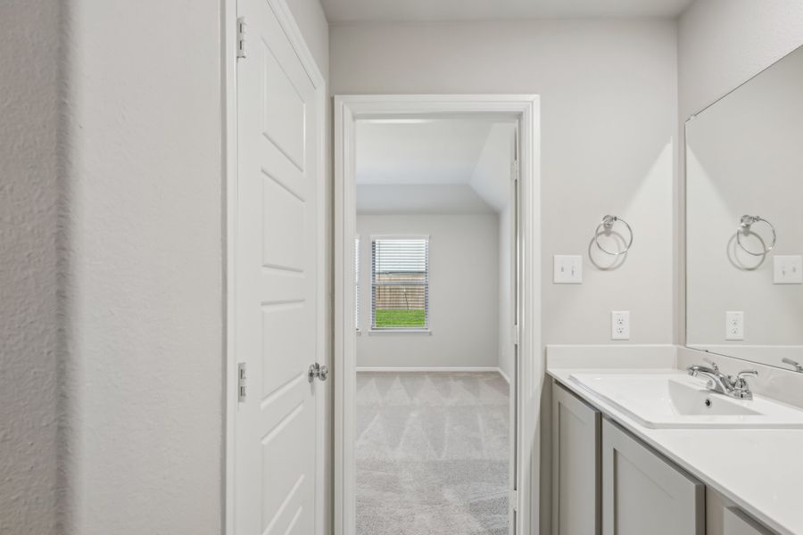 Primary Bathroom in the Hadley home plan by Trophy Signature Homes – REPRESENTATIVE PHOTO