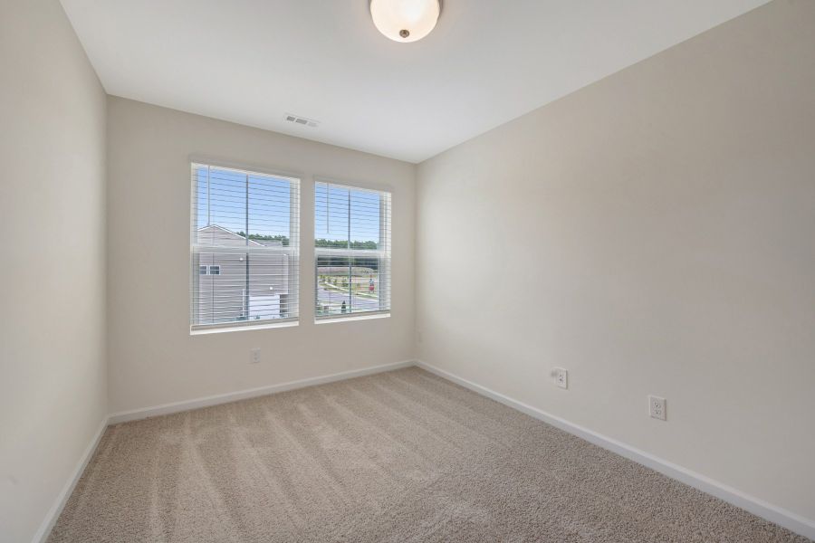 Spacious, unfurnished interior of a new home in Townes on Leesville, Durham (Image 27).