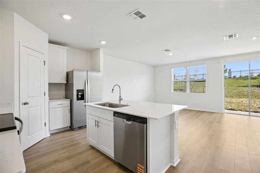 Furnished interior view inside a new home in The Reserve at Hammock Oaks Townes, Lady Lake (Image 7).