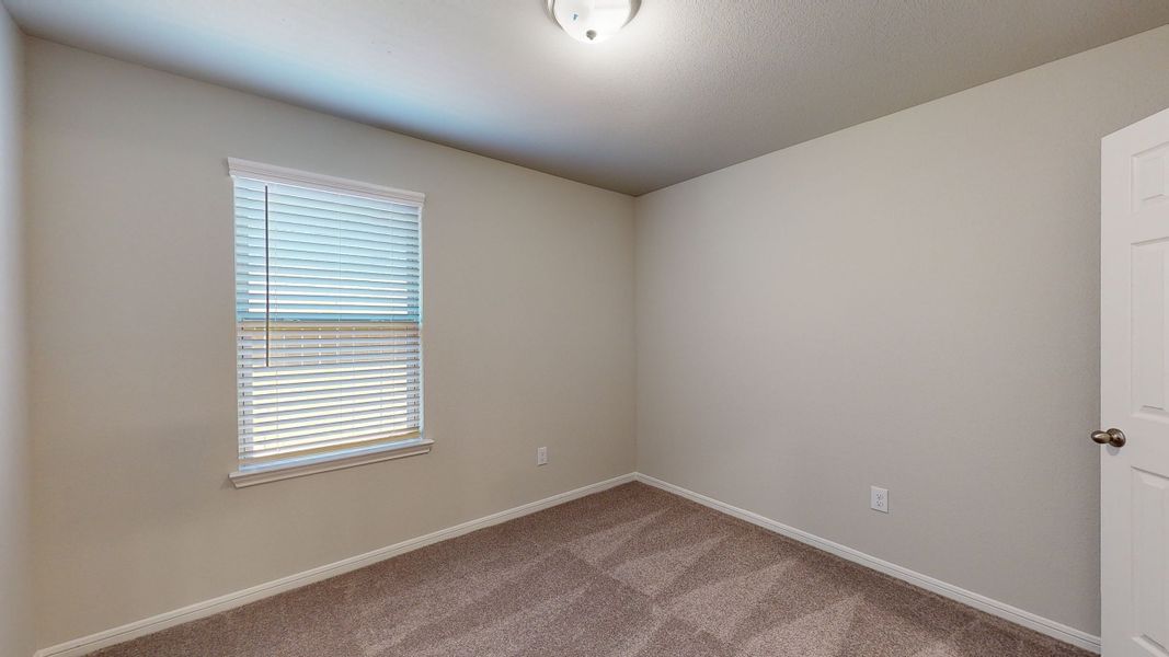 Representative unfurnished interior of a home built from the Floor Plan 1605 by Colina Homes in River Ranch, Dayton (Image 17).