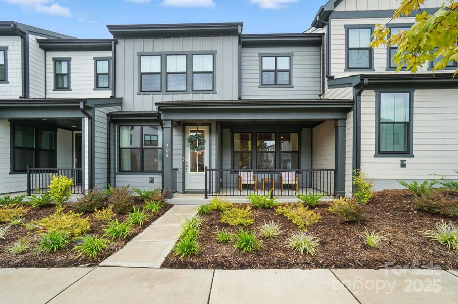 Front exterior of a new home in Seven Oaks, Belmont, NC, highlighting curb appeal (Image 2).