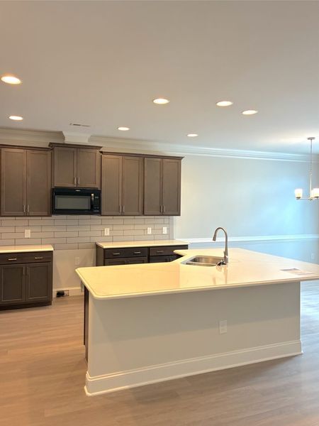 Furnished interior view inside a new home in Weybridge, Burlington (Image 6).