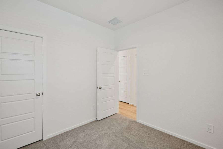 Spacious, unfurnished interior of a new home in Sanford Farms - Traditional Series, Waller (Image 21).