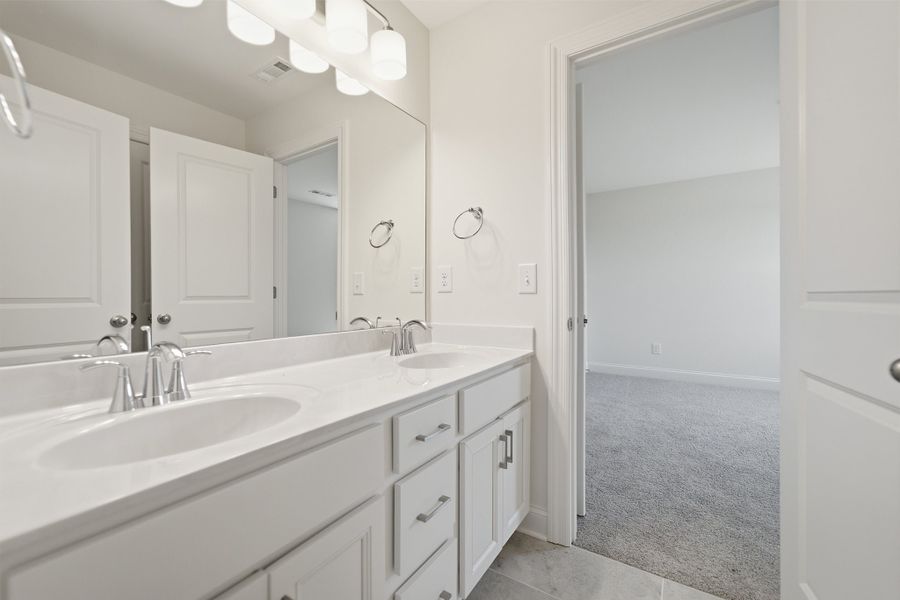 Furnished interior view inside a new home in Aden Woods, Fairview (Image 14).