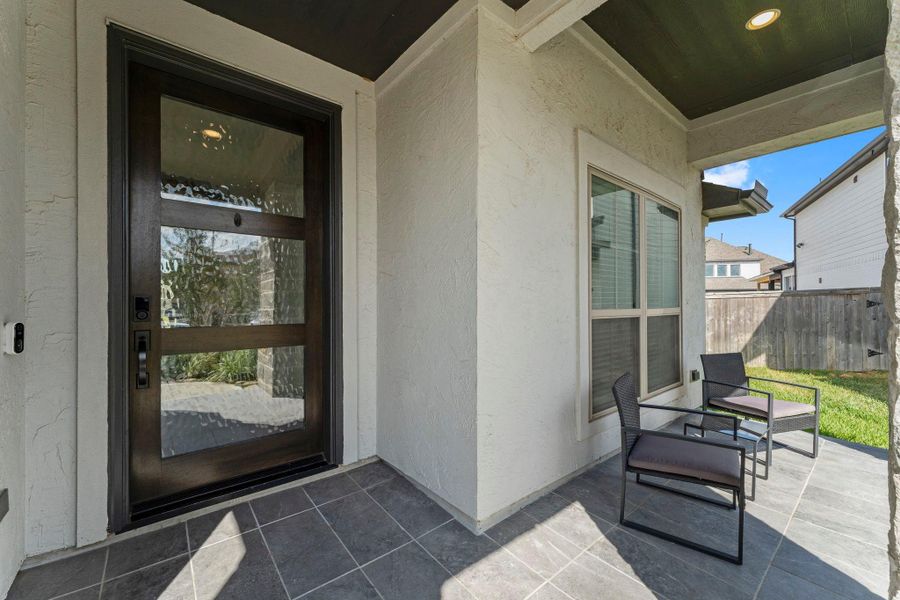 The lovely covered front porch makes a grand first impression that’s even better in person. The lovely covered front porch makes a grand first impression that’s even better in person.