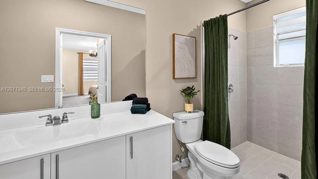 Furnished interior view inside a new home in Acacia Groves, Miami (Image 7). Furnished interior view inside a new home in Acacia Groves, Miami (Image 7).