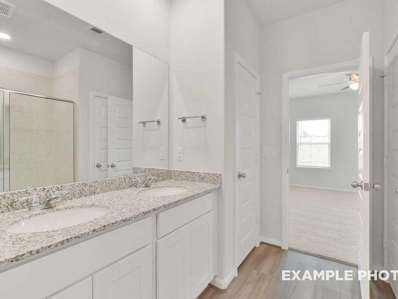 Furnished interior view inside a new home in Caney Creek Place, Conroe (Image 11).