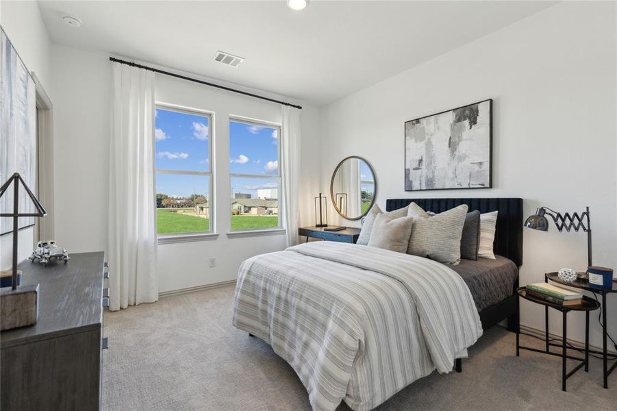 One of two nicely sized secondary bedrooms in our Tatum floor plan.