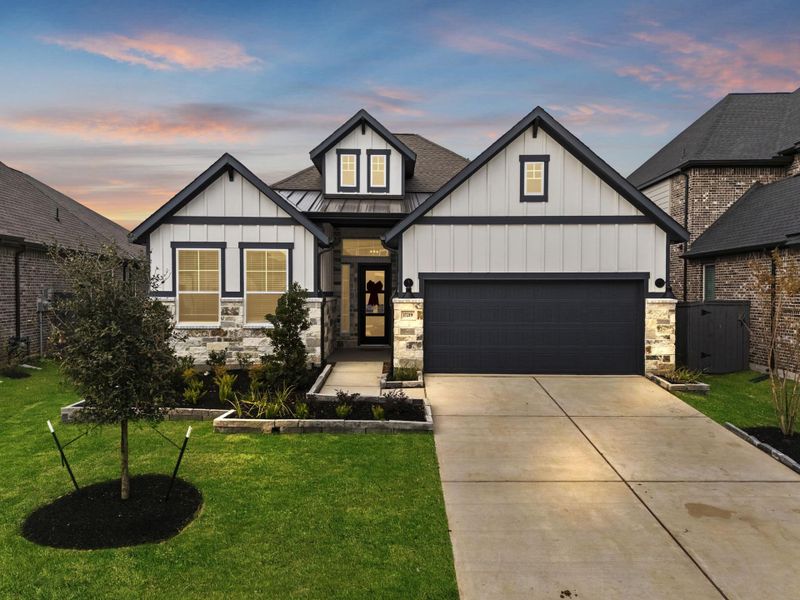 Representative exterior photo of a completed home built from the Summerton by Chesmar Homes in Grange, Katy, TX (Image 18).