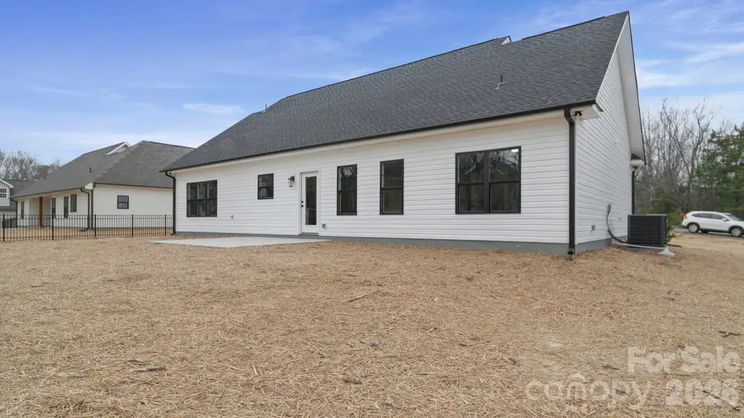 Exterior details and patio area of a home in , Oakboro (Image 4).