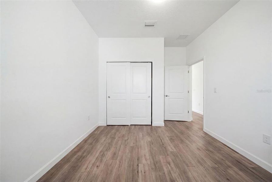 Spacious, unfurnished interior of a new home in The Timbers at Everlands, Palm Bay (Image 25).