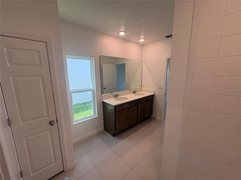 Furnished interior view inside a new home in Eagletail Landings, Howey-in-the-Hills (Image 8).