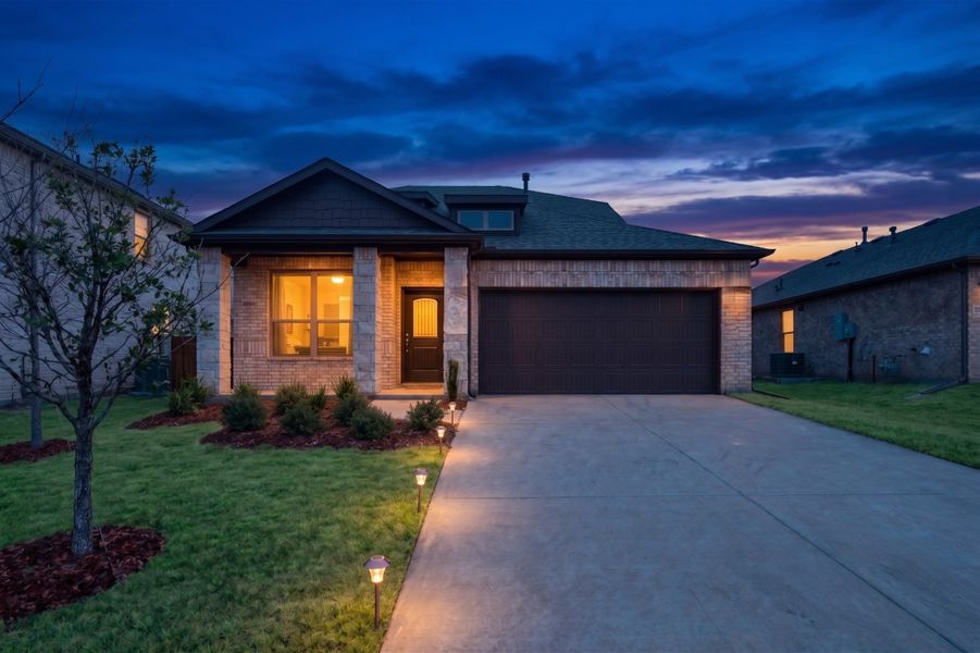 Front exterior of a new home in Stonecreek, Sulphur Springs, TX, highlighting curb appeal (Image 2). Front exterior of a new home in Stonecreek, Sulphur Springs, TX, highlighting curb appeal (Image 2).