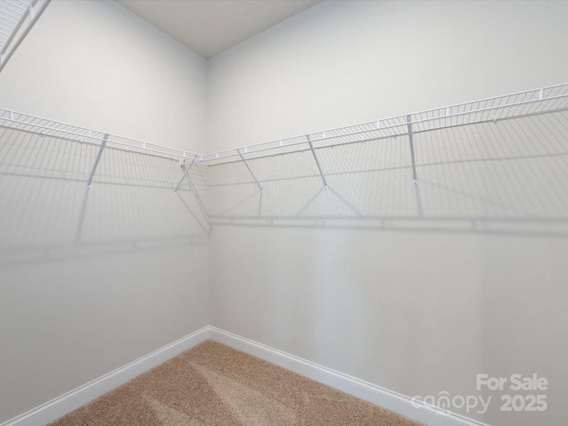 Walk-In Primary Closet.