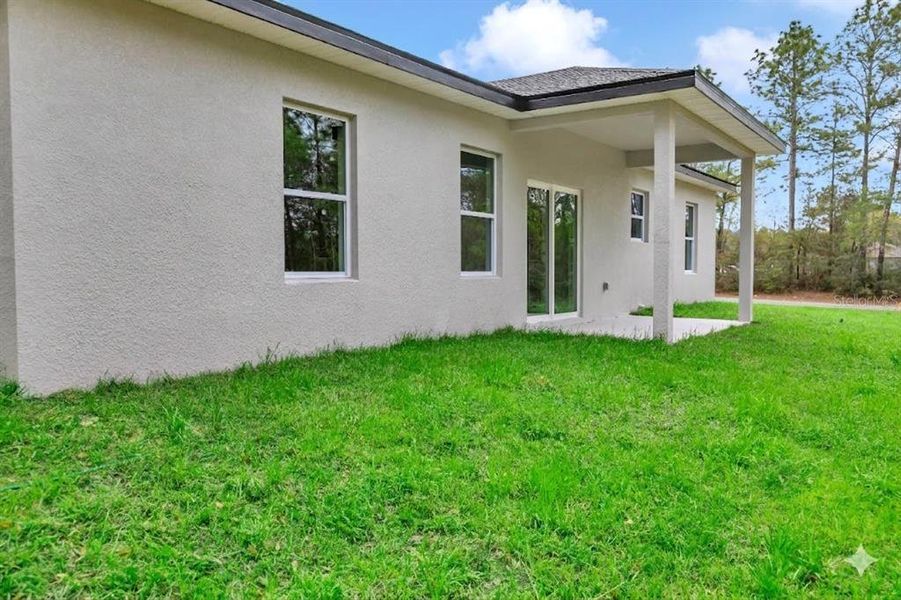 Exterior details and patio area of a home in , Citrus Springs (Image 21). Exterior details and patio area of a home in , Citrus Springs (Image 21).