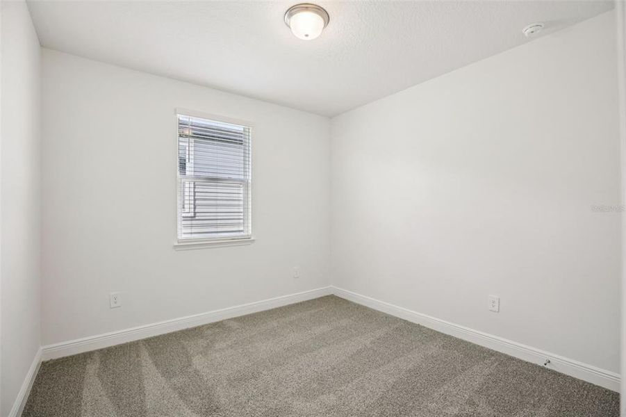 Spacious, unfurnished interior of a new home in Cyrene at Minneola - Villas, Minneola (Image 18).
