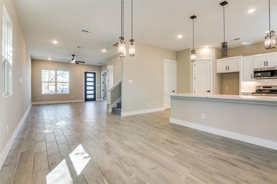 View from breakfast area, kitchen and into family room and 9 foot ceilisngs View from breakfast area, kitchen and into family room and 9 foot ceilisngs