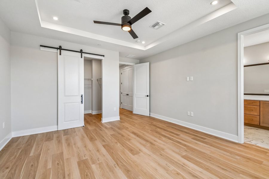 Spacious, unfurnished interior of a new home in EvenTide, New Smyrna Beach (Image 7).