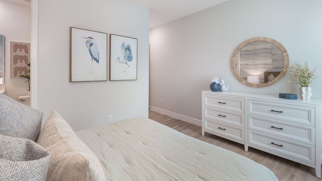 Representative furnished interior of a home built from the DENHAM by D.R. Horton in Lakes of Mount Dora, Mount Dora (Image 32).