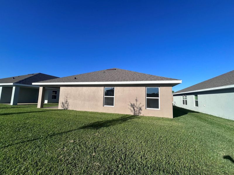 Exterior details and patio area of a home in Waterstone 52, Fort Pierce (Image 16).