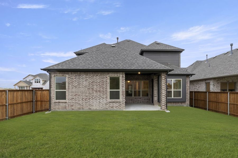 Exterior details and patio area of a home in River Ranch, Van Alstyne (Image 4).