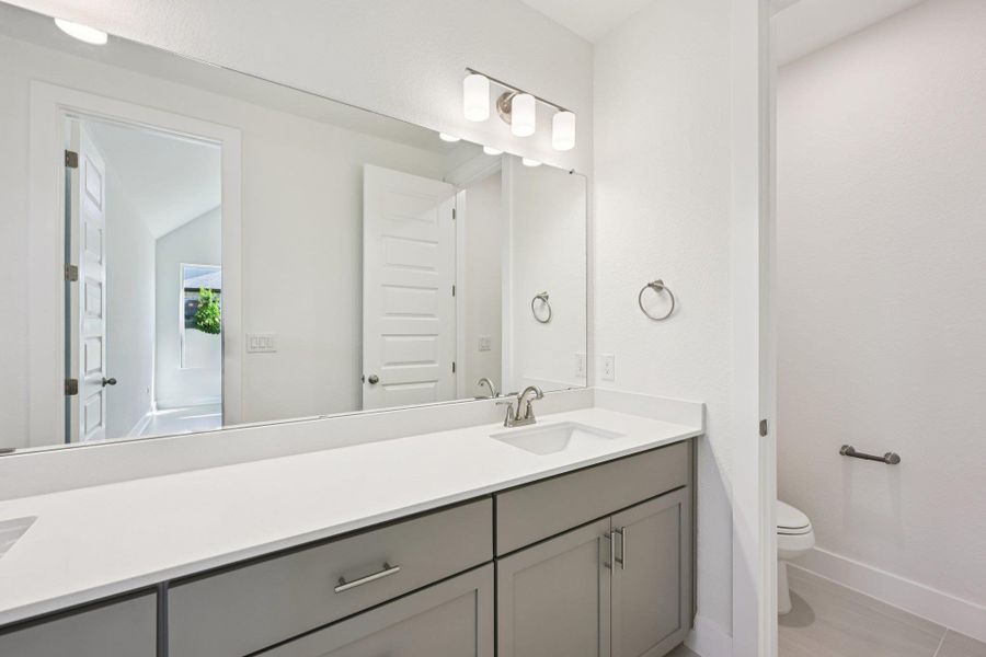 Furnished interior view inside a new home in Persimmon, Buda (Image 8). Furnished interior view inside a new home in Persimmon, Buda (Image 8).