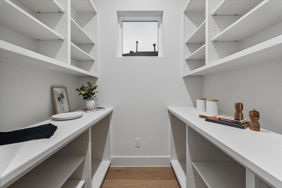 The walk-in pantry will allow all of your organizational dreams to come true!