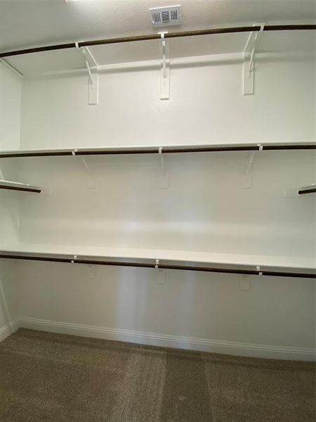 Master closet w/3rd rail for seasonal storage