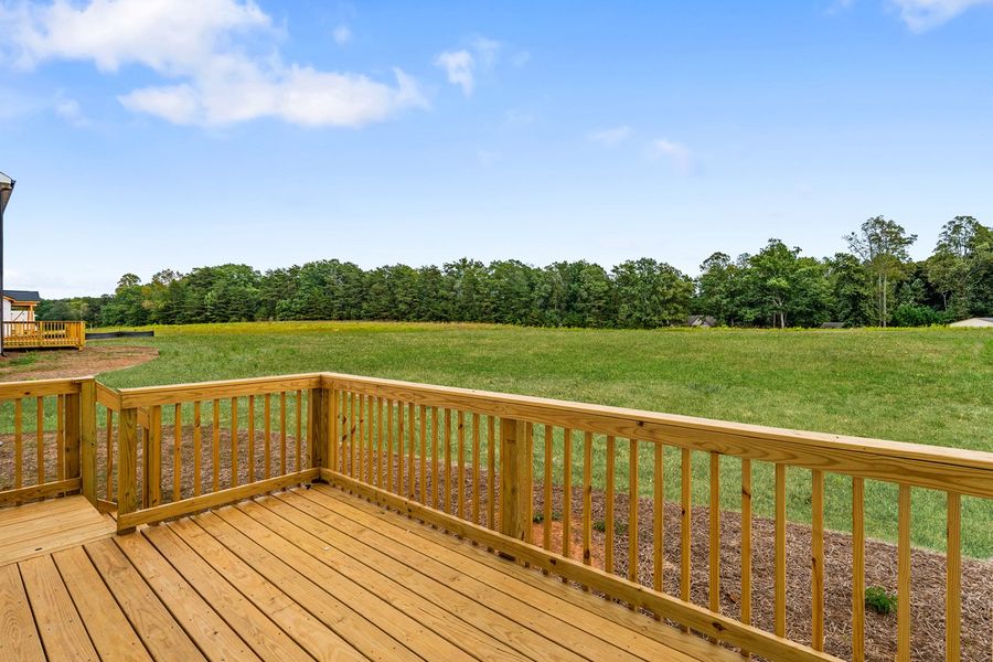 Exterior details and patio area of a home in Lilah Grove, Summerfield (Image 4).
