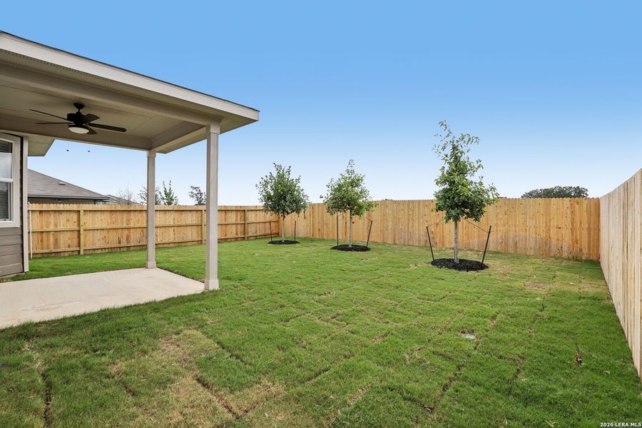 Exterior details and patio area of a home in Thomas Pond, San Antonio (Image 24).