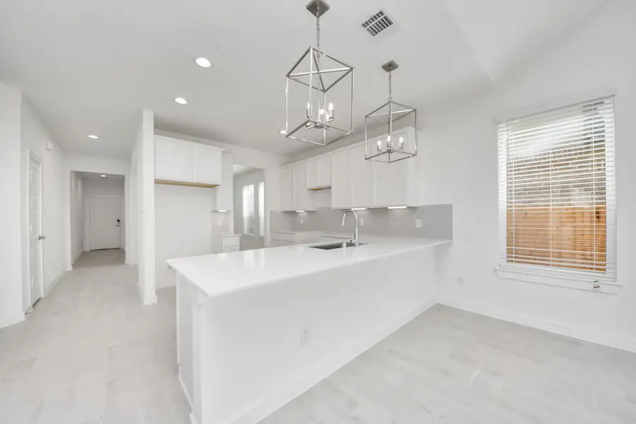This generously spacious kitchen is a dream realized!