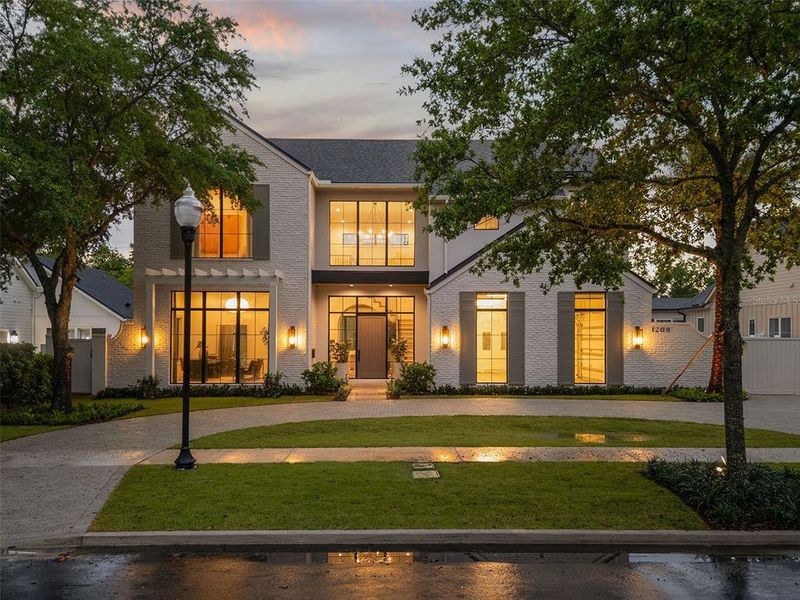 Front exterior of a new home in , Orlando, FL, highlighting curb appeal (Image 25).