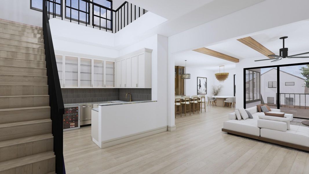 The first floor landing leads to the heart of the home where guests and family will gather between the family room, kitchen, dining room and wet bar. Each elegantly appointed with custom cabinets, beamed ceilings and finishes curated by Steve Clifton of Scene One Interiors.