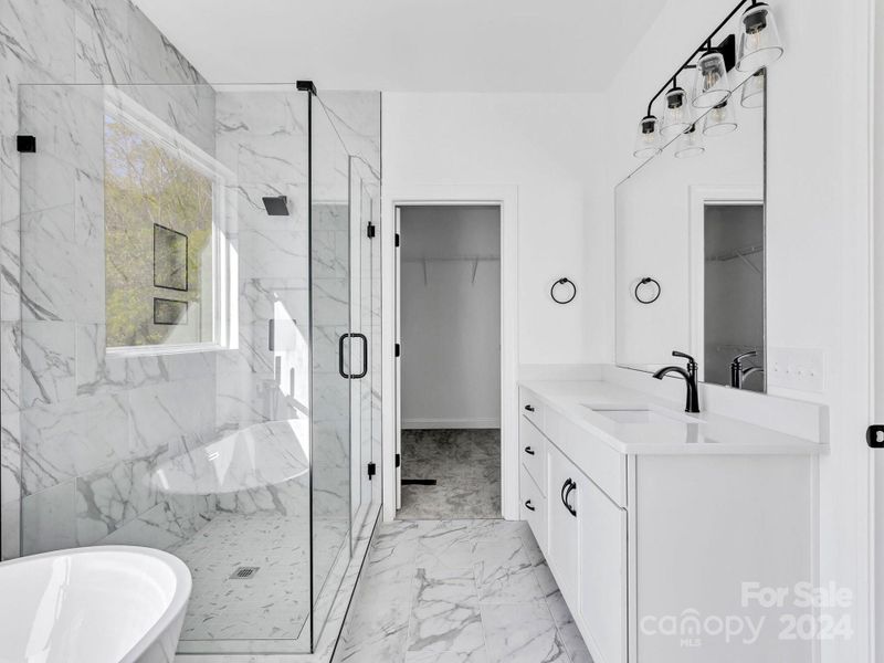 Best Bathroom in the neighborhood this one is simply elegant with clean lines & contrasting fixtures.