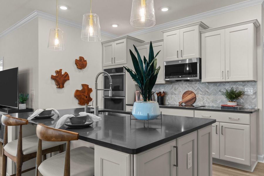 Representative furnished interior of a home built from the The Hibiscus by Chesapeake Homes in Coastal Club of the Carolinas, Calabash (Image 23).