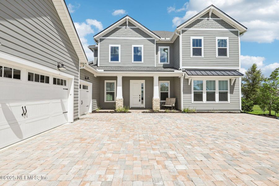 Front exterior of a new home in , St. Augustine, FL, highlighting curb appeal (Image 24).