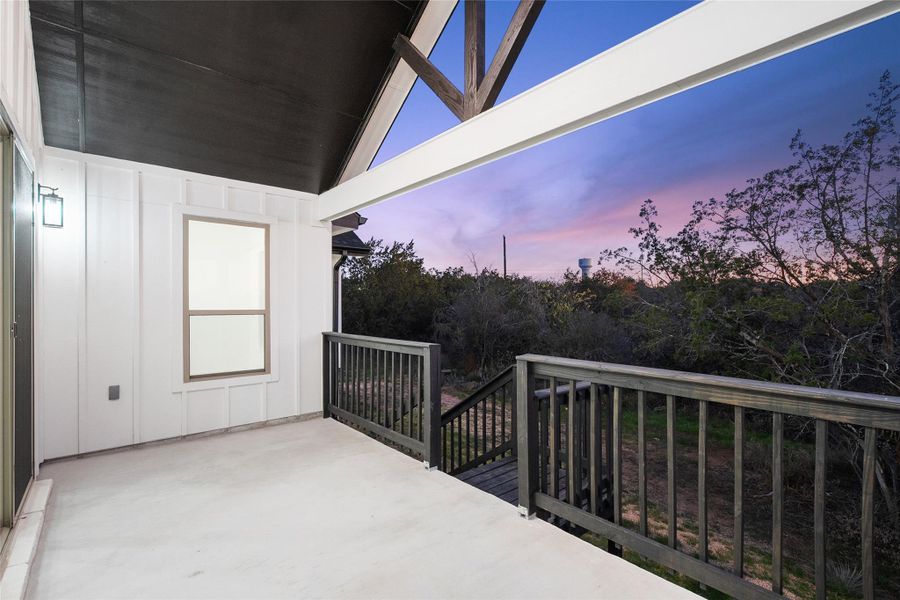 Balcony at dusk with a patio