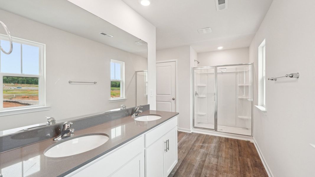 Furnished interior view inside a new home in Reedy Creek Preserve, Charlotte (Image 8).