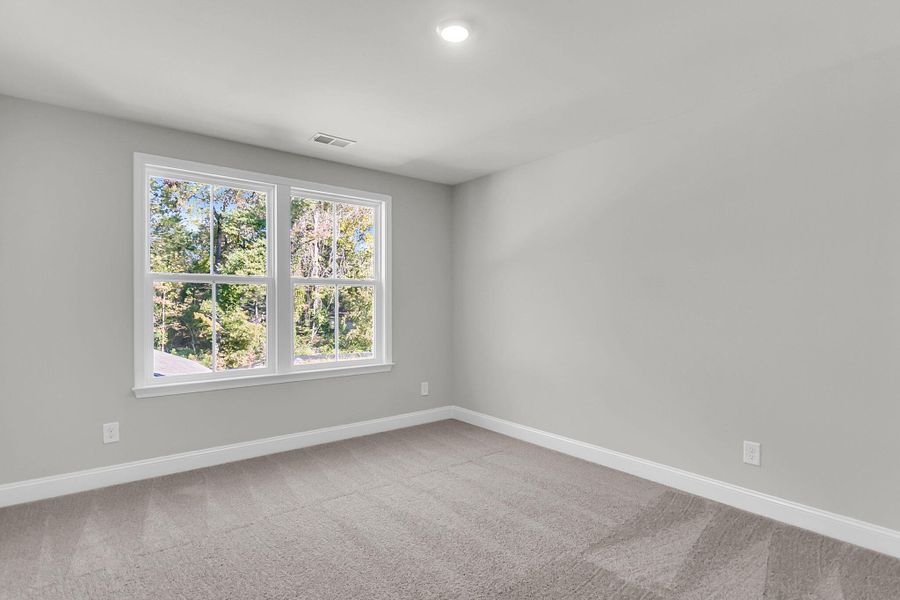Spacious, unfurnished interior of a new home in Sweetgrass Station, Summerville (Image 23).