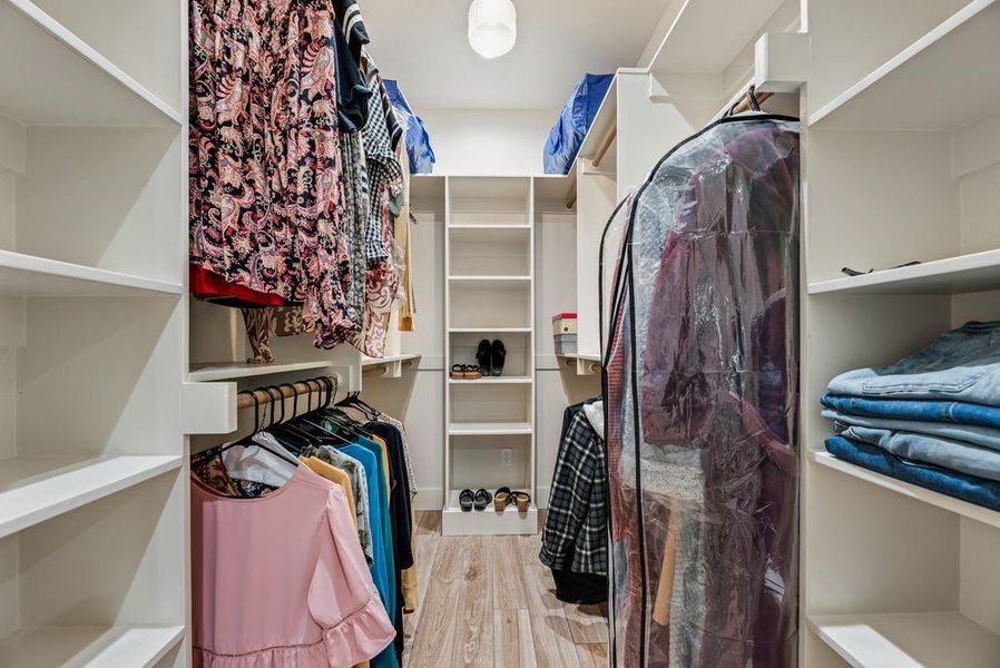 Primary Bedroom custom closet is HUGE