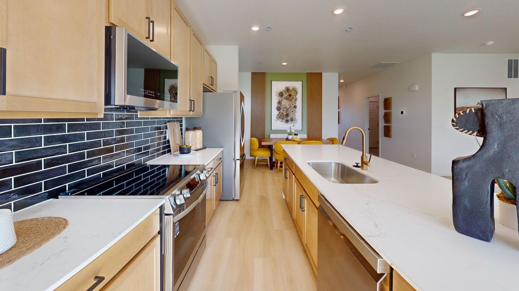 Representative furnished interior of a home built from the Somerset by Baessler Homes in Union Colony West, Evans (Image 9).