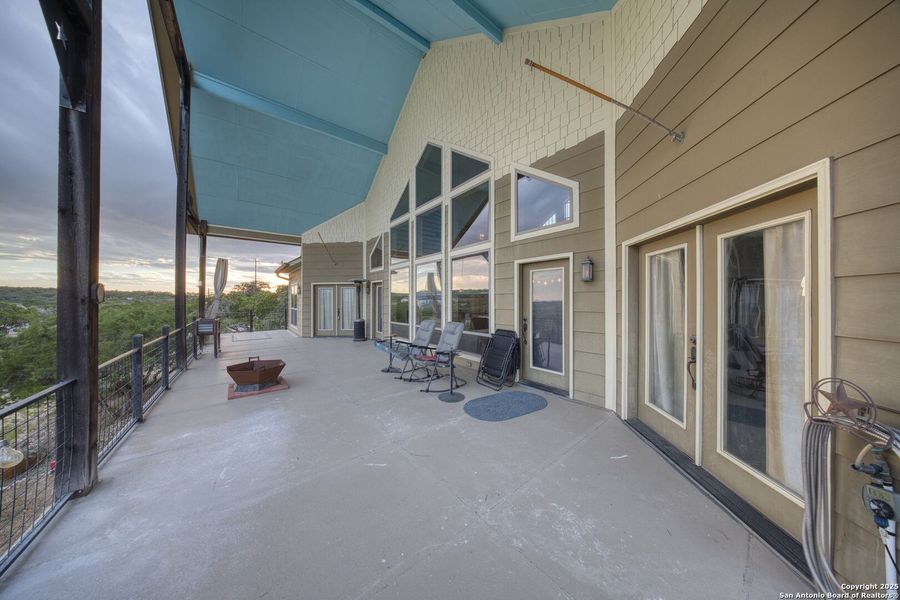 Exterior details and patio area of a home in , Lakehills (Image 2).